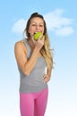 beautiful woman holding green apple fruit in healthy natural nutrition and fitness concept Royalty Free Stock Photo