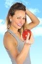 beautiful woman holding green apple fruit in healthy natural nutrition and fitness concept Royalty Free Stock Photo