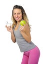 beautiful woman holding green apple fruit in healthy natural nutrition and fitness concept Royalty Free Stock Photo