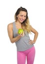 beautiful woman holding green apple fruit in healthy natural nutrition and fitness concept Royalty Free Stock Photo
