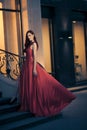 beauty woman in fluttering red dress Royalty Free Stock Photo