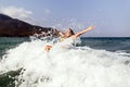 bikini girl happy jump sea waves splash Royalty Free Stock Photo