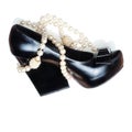 black woman shoe and pearl necklace Royalty Free Stock Photo