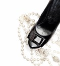 black woman shoe and pearl necklace Royalty Free Stock Photo