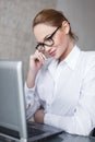 blonde businesswoman online flirt in office Royalty Free Stock Photo