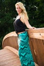 blonde fashion model on a bridge Royalty Free Stock Photo