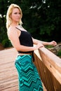 blonde fashion model on a bridge Royalty Free Stock Photo