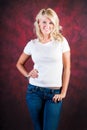 blonde girl fashion model in blue jeans Royalty Free Stock Photo