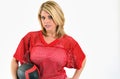 blonde woman in red mesh football jersey Royalty Free Stock Photo