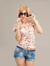 blonde woman with sunglasses posing Royalty Free Stock Photo