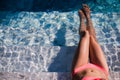 body of beautiful woman. Girl relaxing in a poll at summer. Royalty Free Stock Photo