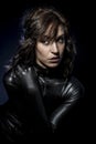 brunette in black latex costume, Fashion shot of a woman in Royalty Free Stock Photo