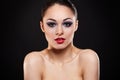 brunette girl with bright makeup and red lips