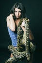 brunette holding python Royalty Free Stock Photo