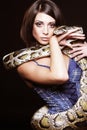 brunette holding python Royalty Free Stock Photo