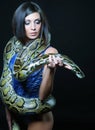 brunette holding python Royalty Free Stock Photo
