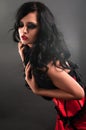 brunette in red corset fur and long hair in s