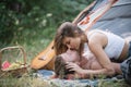 Sexy coupl kiss on camp. Loving young coupl near camp tent. Camping couple in love. Couples of lovers tourists relax on Royalty Free Stock Photo