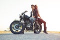 couple of bikers on the vintage custom motorcycle Royalty Free Stock Photo