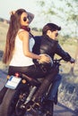 couple of bikers on the vintage custom motorcycle Royalty Free Stock Photo