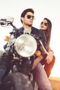 couple of bikers on the vintage custom motorcycle Royalty Free Stock Photo