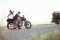 couple of bikers on the vintage custom motorcycle Royalty Free Stock Photo