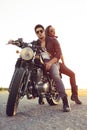 couple of bikers on the vintage custom motorcycle Royalty Free Stock Photo