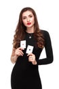 curly hair brunette posing with two aces cards in her hands, poker concept isolation on white background Royalty Free Stock Photo