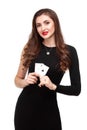 curly hair brunette posing with two aces cards in her hands, poker concept isolation on white background Royalty Free Stock Photo