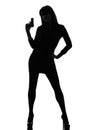 detective woman holding aiming gun silhouette