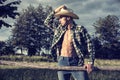 farmer or cowboy with unbuttoned shirt Royalty Free Stock Photo