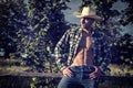 farmer or cowboy with unbuttoned shirt