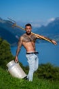 Sexy farmer. Handsome shirtless man in nature. Muscular male fit body. Strong athletic man. Fit male model. Healthy Royalty Free Stock Photo