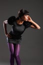 fashion model in purple tights black dress