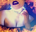 Fashion photo of Female high body part framed with flames