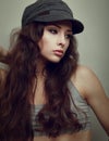 female model posing in modern cap