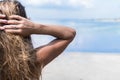 Sexy girl. beautiful woman. model lady bikini underwear sit edge of water swim pool on the roof of luxury resort hotel Royalty Free Stock Photo