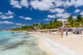 Sexy girl lady standing in blue bikini on a white sand beach, turquoise caribbean sea, Isla Mujeres island, Caribbean Sea, Cancun Royalty Free Stock Photo