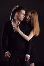 A sexy girl during a passionate embrace clung to the hair of her man Royalty Free Stock Photo