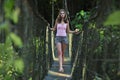 girl on the rope bridge Royalty Free Stock Photo