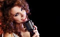 Girl singing in retro mic Royalty Free Stock Photo