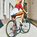 girl on a sport style bicycle