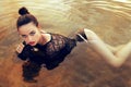 girl wears elegant dress, posing on the summer beach Royalty Free Stock Photo