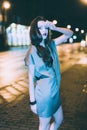 gorgeous brunette girl portrait in night city lights Royalty Free Stock Photo