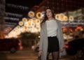 Sexy gorgeous brunette girl portrait in night city lights. Vogue fashion style portrait of young pretty beautiful woman Royalty Free Stock Photo