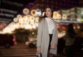 Sexy gorgeous brunette girl portrait in night city lights. Vogue fashion style portrait of young pretty beautiful woman Royalty Free Stock Photo