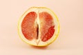 Sexy grapefruit, erotic concept. Sectional grapefruit is a symbol of the vagina and clitoris. Erotic half of grapefruit in a Royalty Free Stock Photo