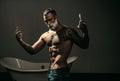 Sexy guy shaving beard. Barber blade. Man with vintage razor. Shaving brush with foam cream. Royalty Free Stock Photo