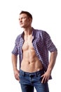 handsome man posing with unbuttoned shirt