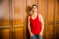 handsome young man standing against wardrobe Royalty Free Stock Photo